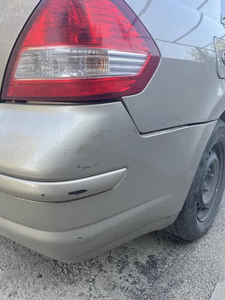 Nissan Tiida 2010, фото 2