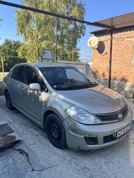 Nissan Tiida 2010, фото 12