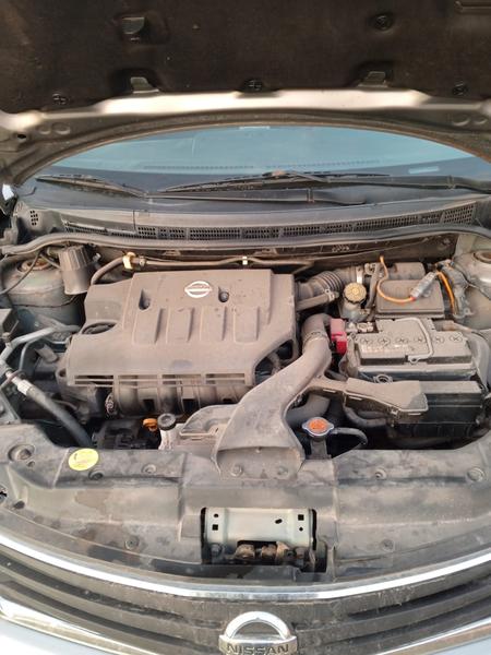 Nissan Tiida 2011, фото 4