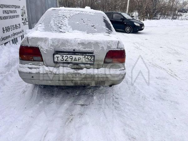 Toyota Corolla 1996, фото 4
