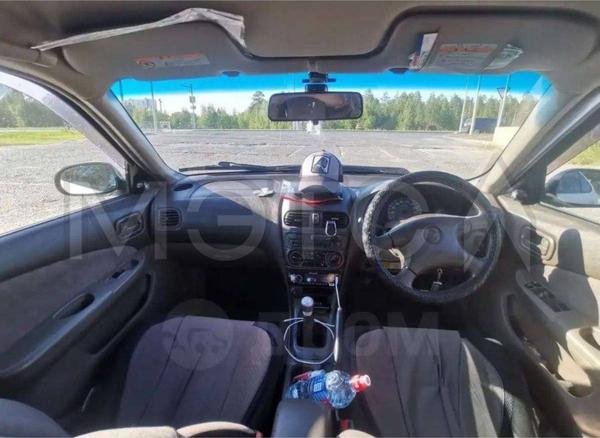 Nissan Sunny 1999, фото 10
