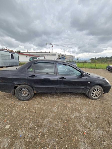 Mitsubishi Lancer 2005, фото 4
