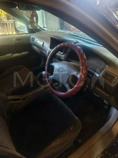 Toyota Corolla 1997, фото 7