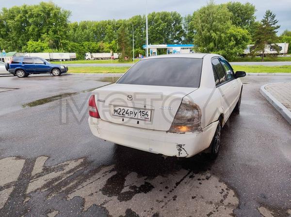 Mazda Familia 1999, фото 4