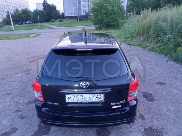 Toyota Corolla 2009, фото 4
