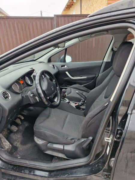 Peugeot 308 2010, фото 9