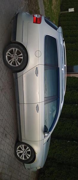 Volkswagen Passat 2010, фото 7