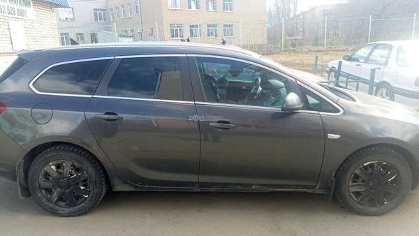 Opel Astra 2011, фото 2