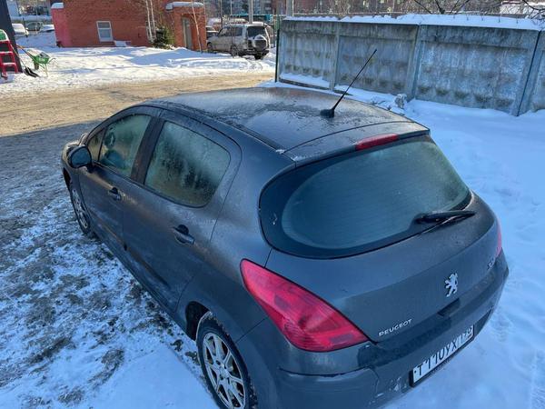 Peugeot 308 2011, фото 10