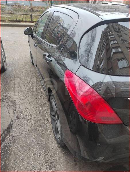 Peugeot 308 2010, фото 8
